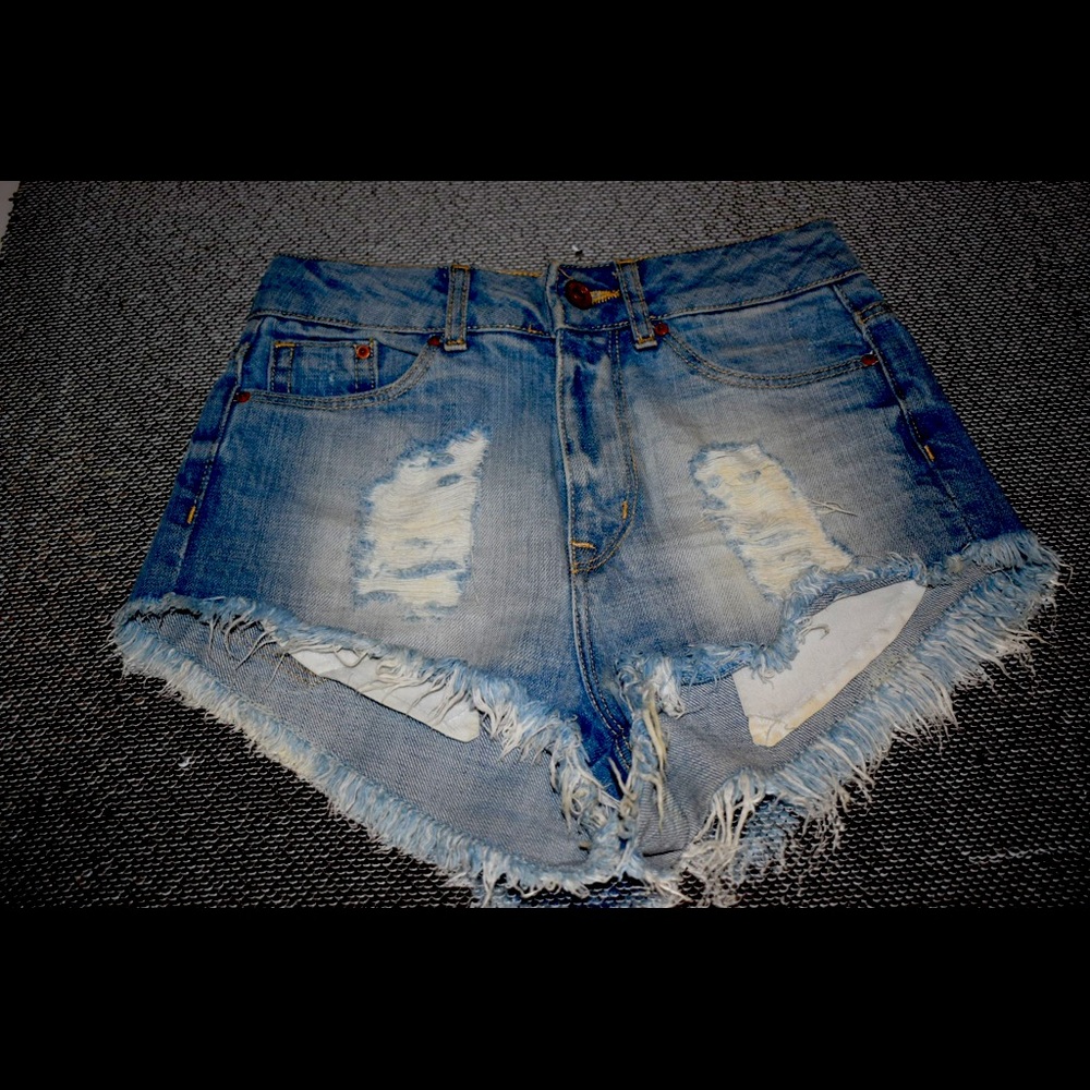 Distressed denim shorts